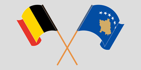 Crossed and waving flags of Kosovo and Belgium