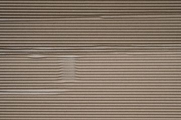 Obraz premium Corrugated paper top view background. Corrugated paper texture for packaging. Brown paper for packaging.