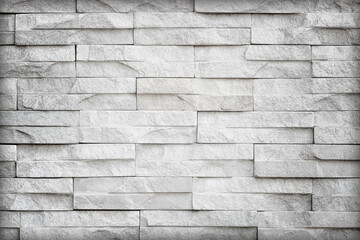 Gray slate wall stone background or texture.