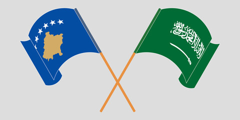 Crossed and waving flags of Kosovo and the Kingdom of Saudi Arabia