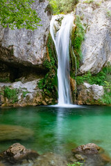 Fototapeta na wymiar Long exposure image of waterfall on the Urlias river