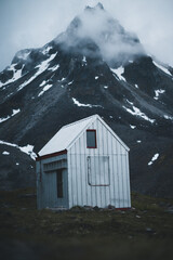 White hut in the mountains