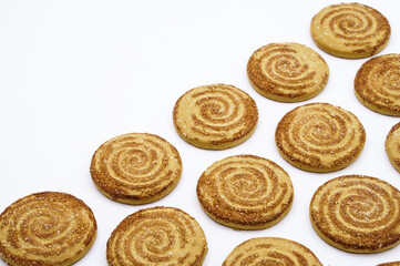 Round cookies sprinkled with sugar. Round cookies. Curled cookies with sugar.
