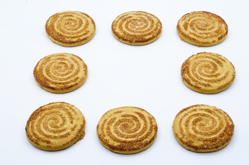 Round cookies sprinkled with sugar. Round cookies. Curled cookies with sugar.