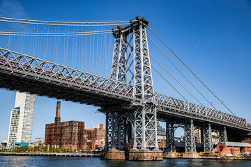 Fototapeta na wymiar A view of the Manhattan Bridge from the East River in New York City.