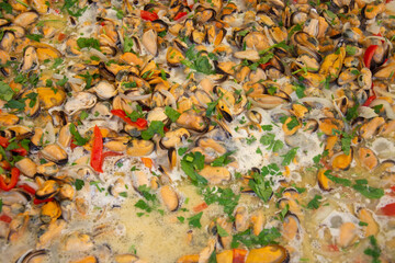 shells with vegetables and shrimp in wine