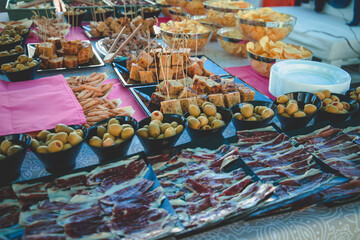 Table full of tasty food beautifully decorated.
