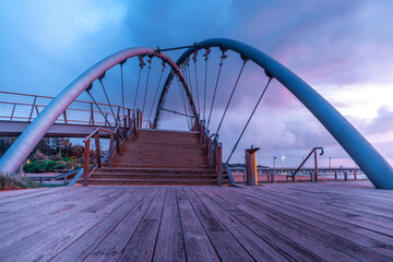 Low angle view of beautiful footbridge in Frankston foreshore at sunset. Melbourne, Australia