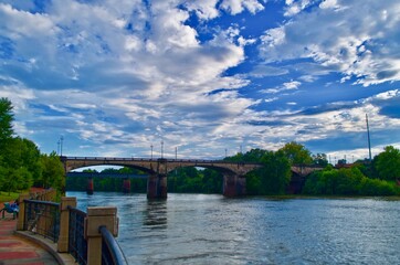 Beautiful Skyline at the arched bridge crossing "Dillingham Street Bridge" view from Chattahoochee riverwalk  in Columbus, Georgia, The United State.