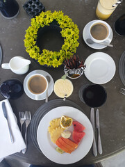 A classic Sri lankan breakfast of Hoppers, fruit and curry