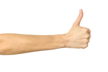 Thumb up. Woman hand gesturing isolated on white