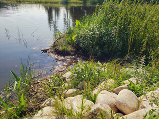 Rocks on the shore at Hickey Lake in Duck Mountain Provincial Park, Manitoba, Canada