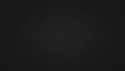 Black paper texture background with soft glowing backdrop, background texture for design