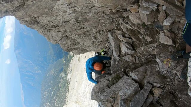 Climbers on the trail from Scala summit to Mytikas summit, the highest mountain of Olympus ridge in Greece. Climbing Mytikas summit
