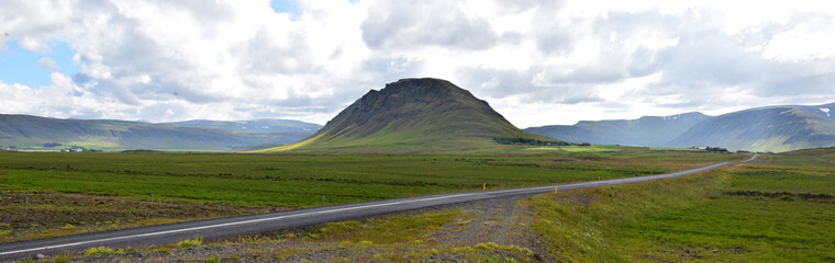 Grassy mound in Iceland, panorama. Icelandic countryside