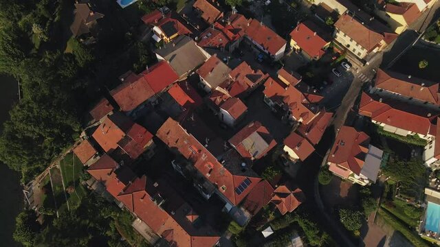 Drone Flies Over The Town of Ranco to Reveal the Beautiful Mountains Over Lake Maggiore