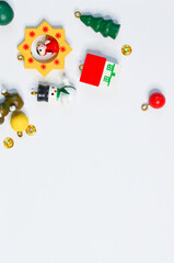 Fototapeta premium Christmas decoration small wooden toys for christmas tree on white background