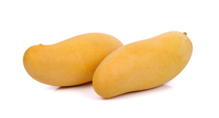 Ripe mangoes on a white background