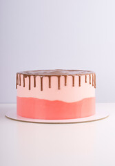 Sponge cake with chocolate smudges and cream cheese cream