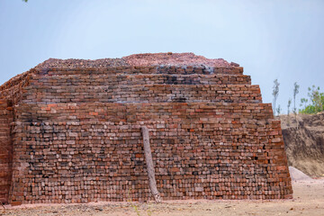 Old red brick wall background texture close up