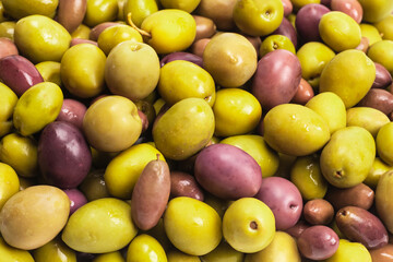 Tasty mix olives background.