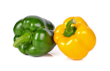 Obraz na płótnie Canvas yellow and green bell peppers (capsicum) on a white background