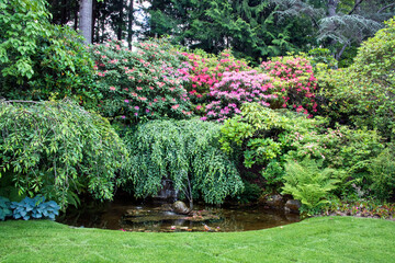 Fototapeta na wymiar Butchart garden with flowers and trees in Victoria, British Columbia, Canada in Spring