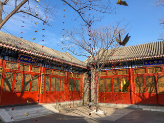 Old courtyard in the palace of Beijing. Traditional Chinese Building of old compound with Paper crane decoration.