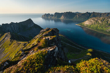 Naklejka premium Beautiful landscape at evening sunset on top of Husfjellet mountain peak in Senja island in summer season, Norway, Scandinavia
