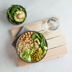 Healthy vegetable lunch from the Buddha bowl with quinoa, avocado, chickpeas. healthy food dish for vegetarians.