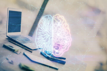 Double exposure of desktop with computer and brain drawing hologram. Artificial intelligence concept.