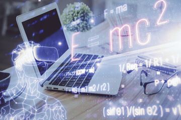 Desktop computer background and formula hologram writing. Double exposure. Education concept.