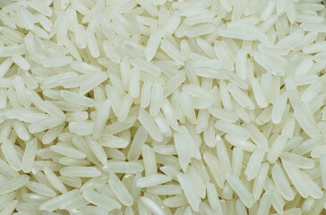 Uncooked Basmati rice close-up. Basmati rice texture, background