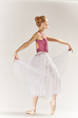 Fototapeta na wymiar Woman ballerina dance performed silhouette light background