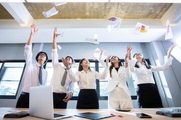Group of Asia business people throwing paper and looking happy. - 377264909
