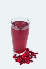 Red berry fruit drink in a glass glass