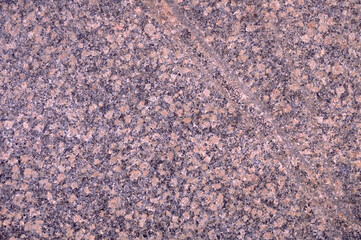Abstract background of brown tiled walkway in a park