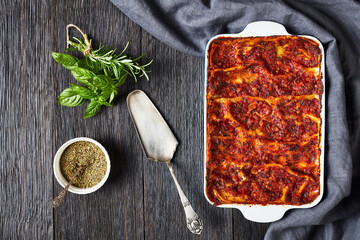 Lasagna with vegan bolognese on a table, flat lay