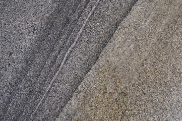 Abstract background of grey tiled walkway in a park
