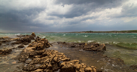 Dramatic storm clouds and rain over the Adriatic Sea in summer