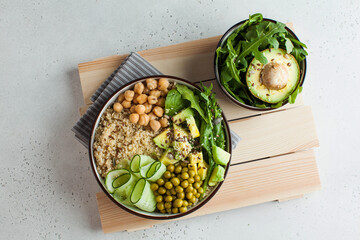 Healthy vegetable lunch from the Buddha bowl with quinoa, avocado, chickpeas. healthy food dish for vegetarians.