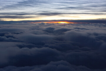 soft and beautiful clouds from above at sunrise, nature at it's best