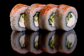 Fresh delicious beautiful sushi rolls on a dark background