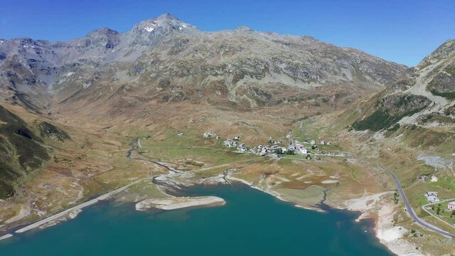 Aerial 4K - Montespluga, Italy, view of the lake towards the Swiss border