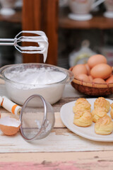 The making of cream puff on wooden table