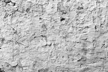 Texture of a concrete wall with cracks and scratches which can be used as a background