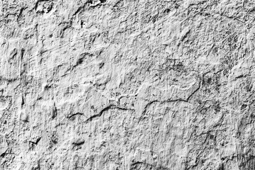 Texture of a concrete wall with cracks and scratches which can be used as a background