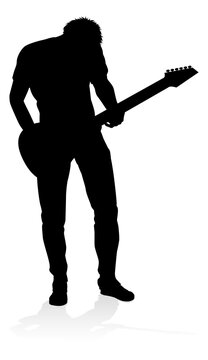 recommend clip art: A guitarist musician in detailed silhouette playing his guitar musical instrument.