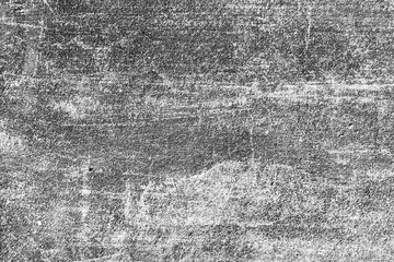 Texture of a concrete wall with cracks and scratches which can be used as a background
