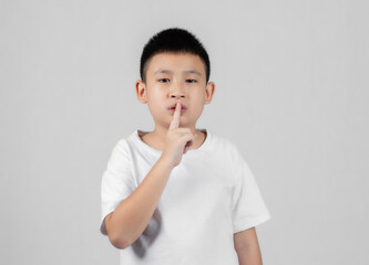 Asian boys studio shot portrait on gray background